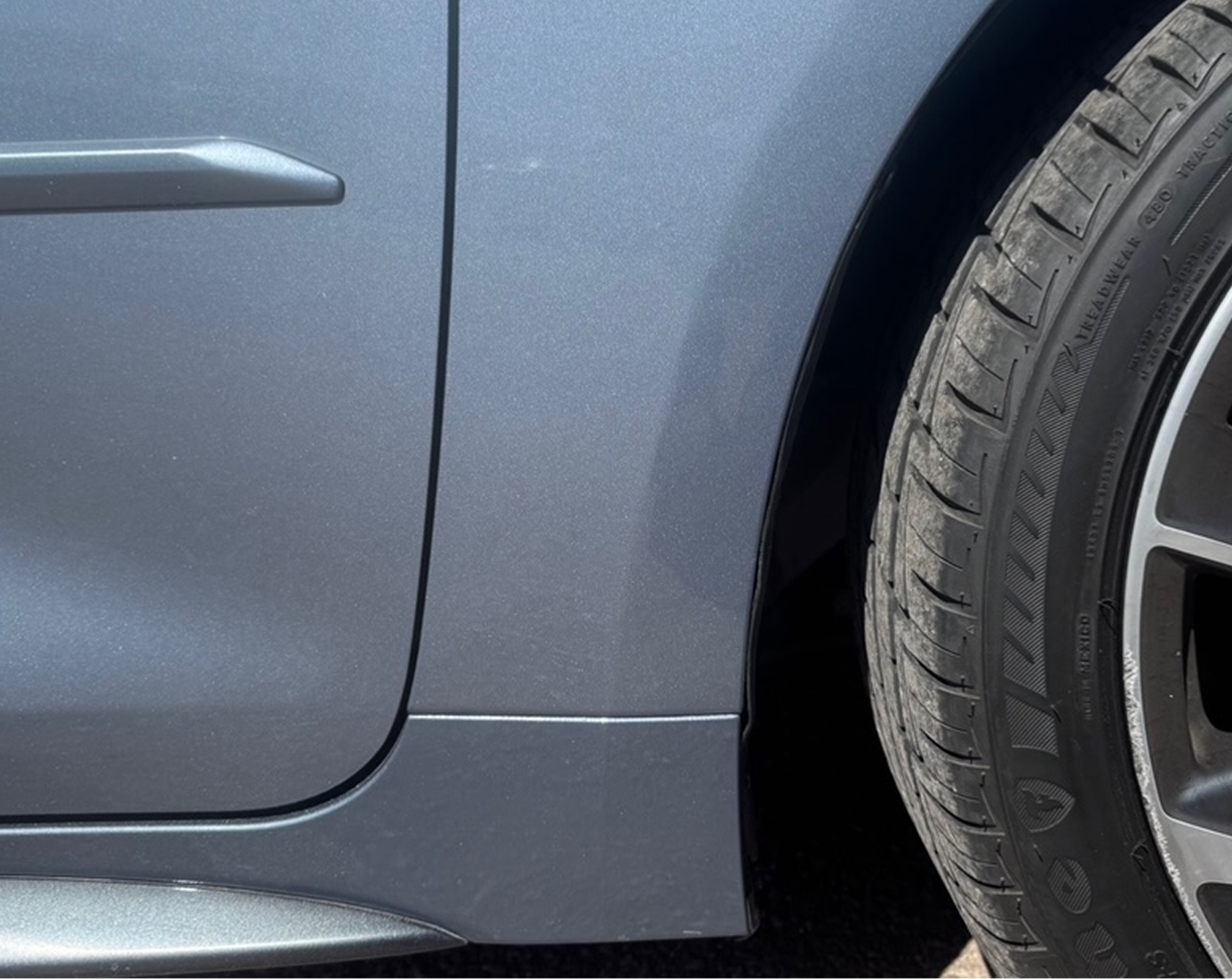 Vehicle wheel and body detail view